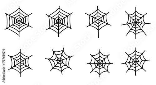 Set of eight unique spider web designs with creative patterns