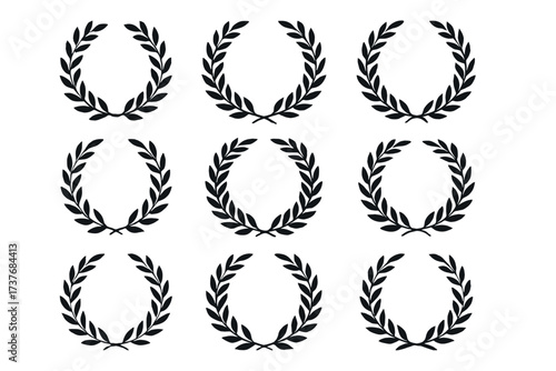 Collection of nine classic black laurel wreaths in symmetrical arrangement