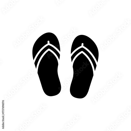 Black flip-flops with white stripes on a neutral background  