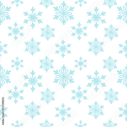 Blue snowflakes seamless pattern with varied sizes on white