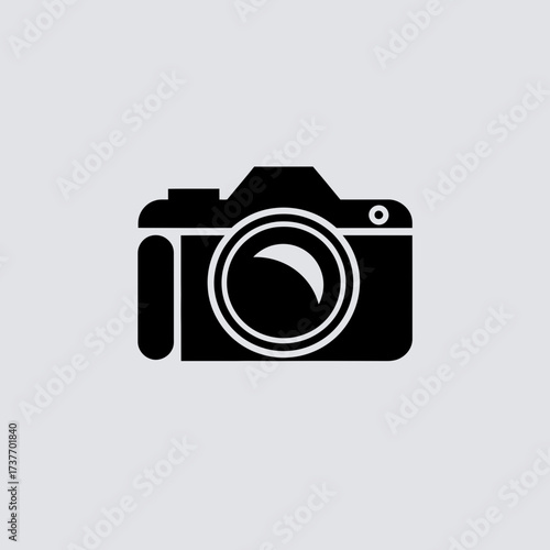 Minimalist flat vector illustration of a camera icon scalable for digital and print media silhouette