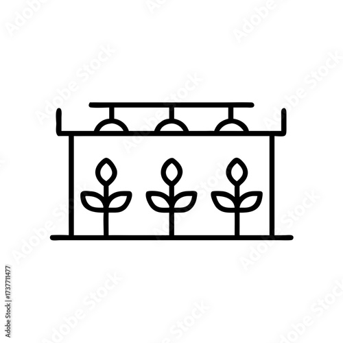 Hydroponic farm setup with plants growing under artificial lights  