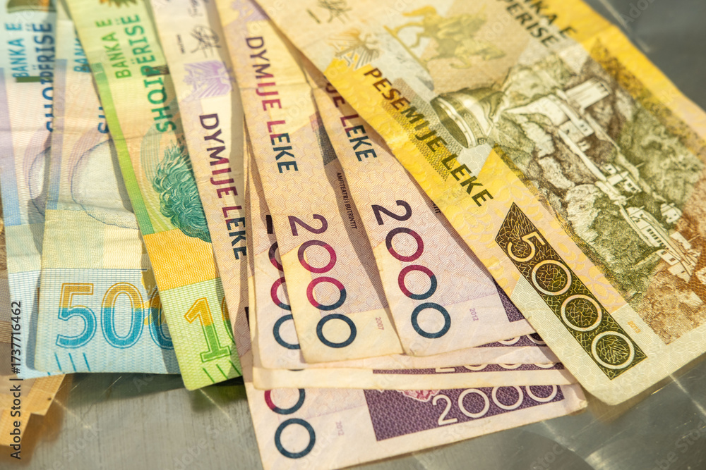 Obraz premium various denominations Albanian lek currency featuring national landmarks, Financial transactions or travel preparation involving local currency in Balkans, inflation, national currency money