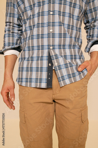 Man in Plaid Shirt and Cargo Pants