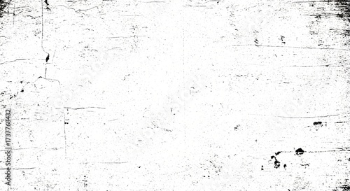 Grungy white background with black distressed vintage dust and grain texture overlay effect. Abstract aged worn wall surface