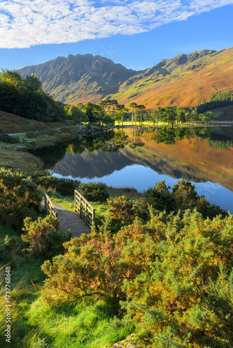 Buttermere lake reflections in the Lake District National Park on an autumn morning.
