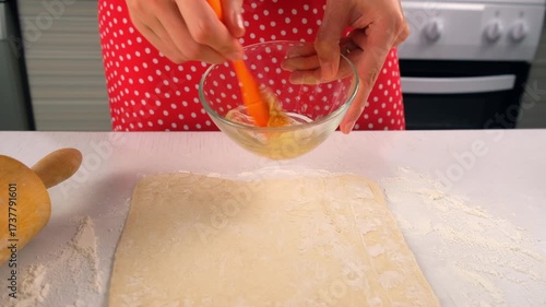 Pastry chef preparing dessert with dough mixing egg white in bowl on kitchen. Create delicious healthy food bakery. Cuisine culinary prepare homemade cook domestic meal baking recipe ingredients.