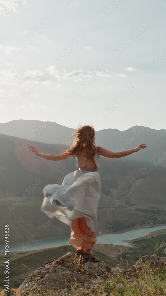 custom made wallpaper toronto digitalSlow motion vertical video redhead woman standing arms wide mountain peak windy river valley cinematic lifestyle freedom inspiration beauty nature mindfulness