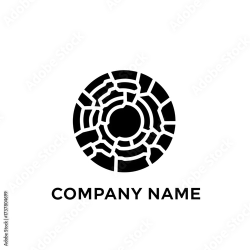 Abstract Circular Mosaic Design with Central Void for Company Branding.