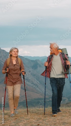 Wallpaper Mural Vertical slow motion senior hikers mountain trail symbol strength resilience longevity freedom healthy lifestyle wellness outdoor activity active aging adventure motivation inspiration Torontodigital.ca