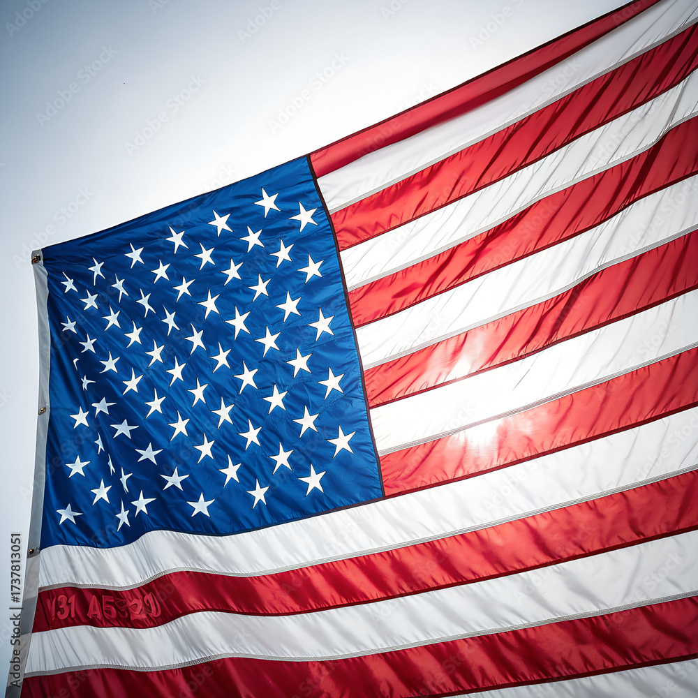 Fototapeta premium Close-Up of American Flag Draped on White – Stars and Stripes with Patriotic Color and Texture