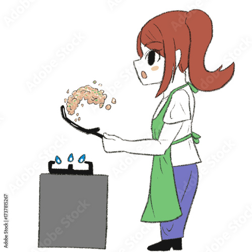 料理をしているエプロンを着た女の子
