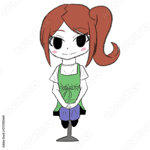 椅子に座っているエプロンを着た女の子