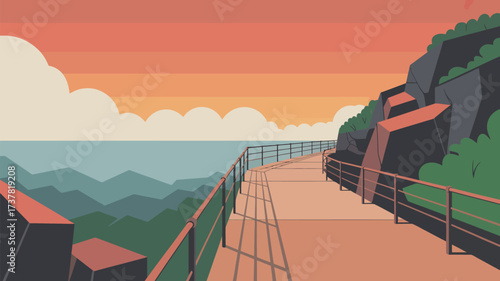 A scenic coastal path with railings overlooking the ocean and mountains under a colorful sky at sunset