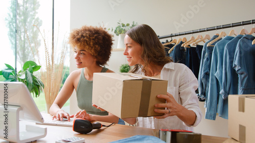 Photos Two Women Running Online Fashion Business From Home Together Taking And Distribu