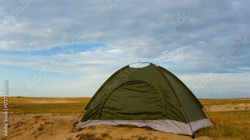  green touristic tent stay in a sand desert time lapse scene