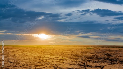  dry wide cracked saline land at the sunset, natural calamity time lapse scene
