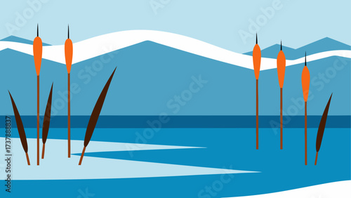 Reeds and mountains in a winter landscape