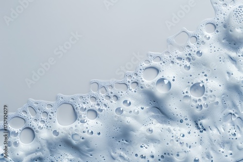 Soap foam with bubbles cleaning on surface, abstract background, cosmetic use