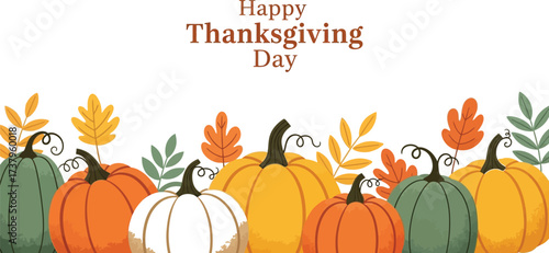 Autumn harvest of colorful pumpkins and leaves celebrates Thanksgiving Day
