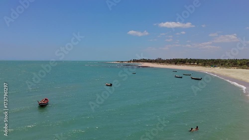 Aerial view of Calm beach at Barra Grande in Cajueiro da praia. With turquoise ocean. Traditional fishing boats at Piaui. Famous brazilian kitesurf travel destination.