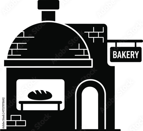 Rustic bakery building with brick oven and loaf of bread