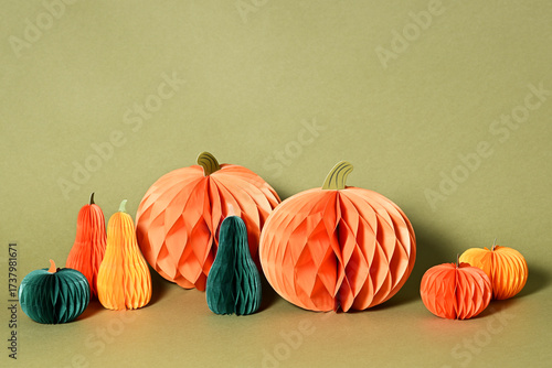 Autumnal composition of paper pumpkins