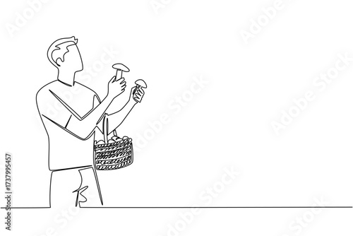 Single continuous line drawing a man holds mushrooms and rattan basket filled with mushrooms slung over hand. Harvest abundantly. National Mushroom Hunting Day. One line design vector illustration