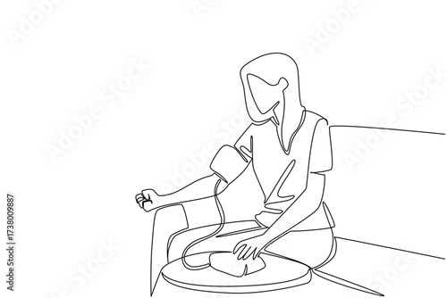 Continuous one line drawing a woman in casual clothes sitting on a sofa and measuring her blood pressure. Health conscious. Check. World Hypertension Day. Single line draw design vector illustration