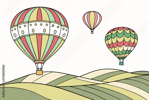 Three colorful hot air balloons over rolling hills 2