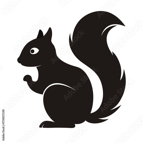 Silhouette of a squirrel, standing on its hind legs