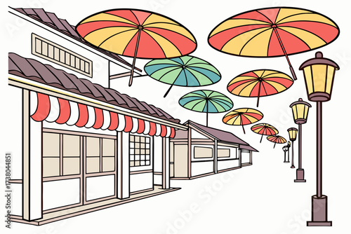 Colorful umbrellas over a street with shops and lampposts