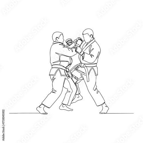 Martial arts combatants engaged in intense grappling competition.