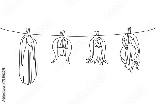 Single one line drawing 4 colorful wigs hung on a clothesline and held in place by clothespins. Care to keep it comfortable when worn. National Wig Out Day. Continuous line design graphic illustration