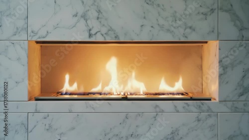 Modern fireplace with elegant marble surround radiates warm, inviting flames on a cozy evening