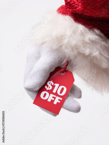 Wallpaper Mural Christmas Sale Concept: Santa Claus Holding a $10 Off Discount Tag Torontodigital.ca