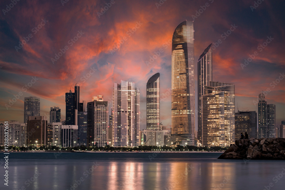 Fototapeta premium Abu Dhabi Seascape with skyscrapers in the background at evening