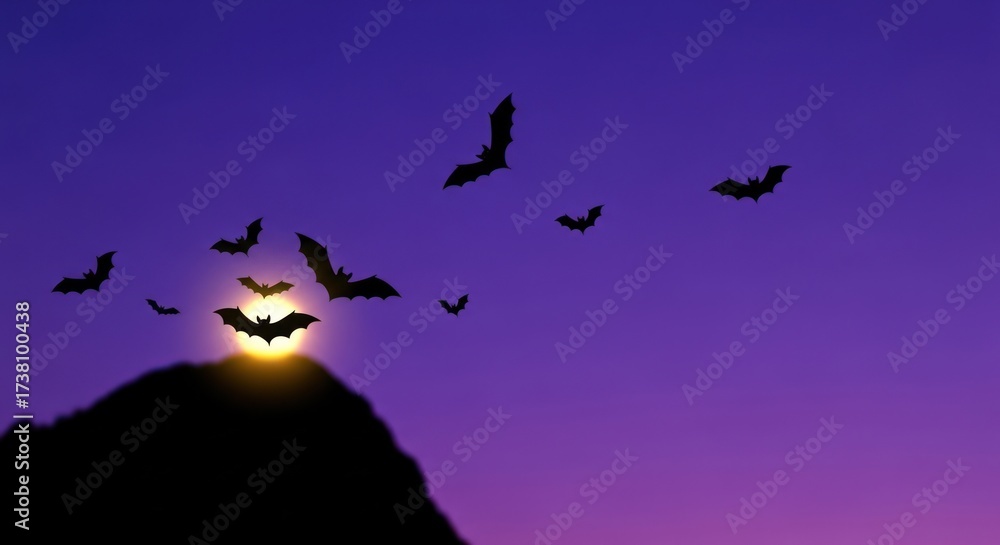 Fototapeta premium Bats flying in the night sky with a full moon behind a dark mountain peak