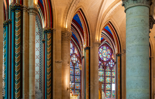 Close-up on archs and stained-glass windows inside a gothic cathedral