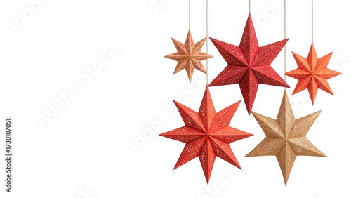 Hanging paper star ornaments in red and gold on white background with copyspace for text