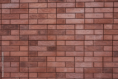 Close-up texture of a modern red brick wall