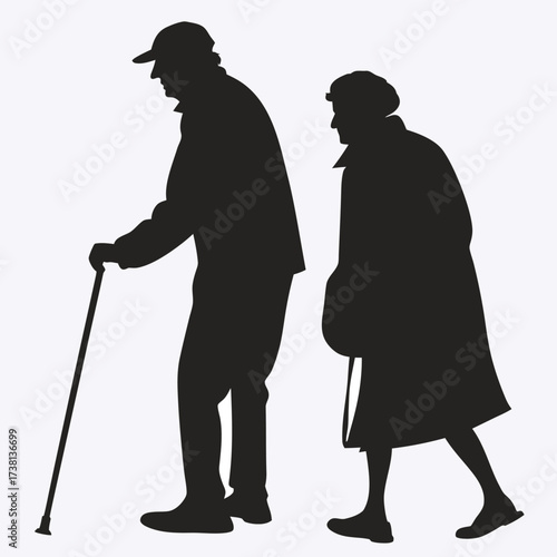 Elderly couple walking with a cane a striking black silhouette