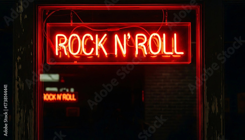 Neon Sign Illuminated Rock 'n' Roll Message in Red Lights - Music & Entertainment Theme