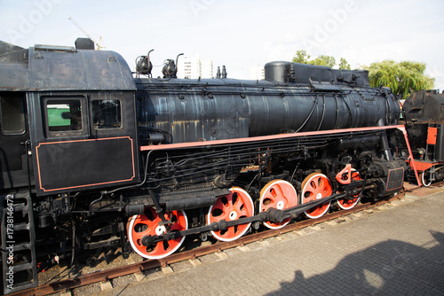 Photography Black old steam locomotive at a museum exhibition, industry