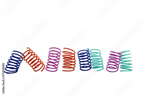 colored plastic spring cat toys in a row