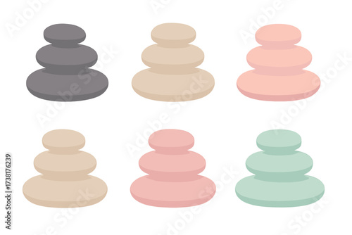 Collection of balanced stone stacks in various pastel colors for tranquility and meditation