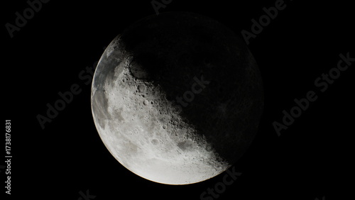 A view of the partially sunlit moon from space
