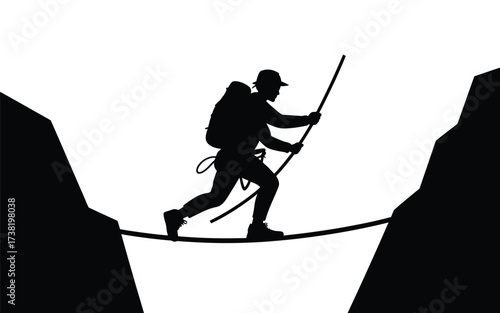 Silhouette of a determined hiker crossing a narrow bridge over a chasm