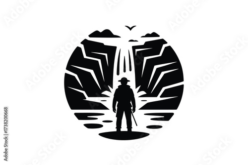 Silhouette of a solitary figure standing before a majestic waterfall and rugged cliffs