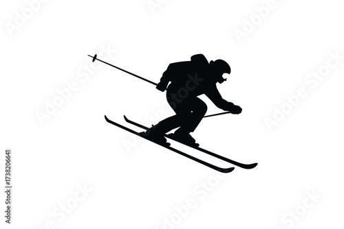 Dynamic silhouette of a skier in action capturing the thrill of winter sports